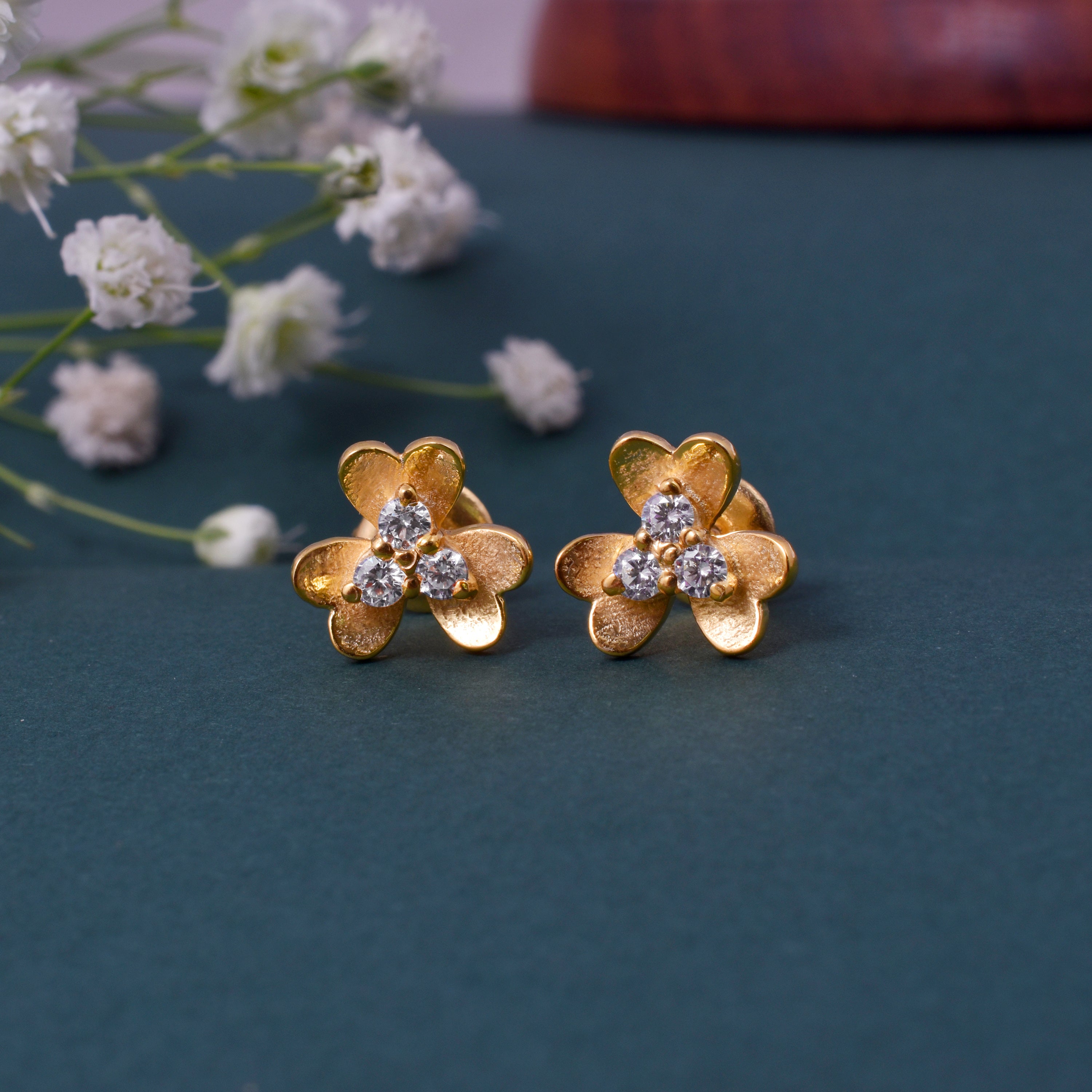 Chanel CC Stud Earrings – Classic Elegance and Luxury